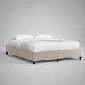 Letto matrimoniale imbottito in tessuto beige con struttura bassa e gambe in metallo nero 160x200 cm